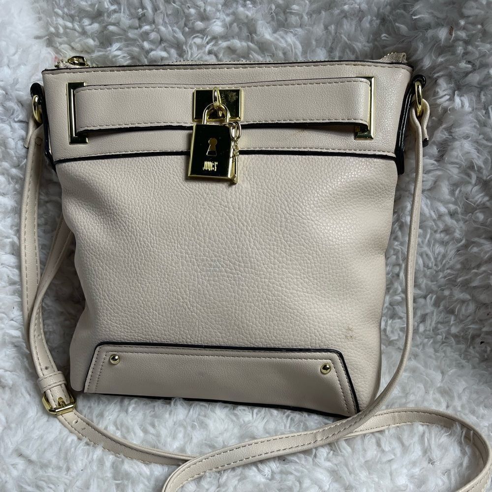 Juicy by Juicy Couture beige crossbody bag with gold tone accent and hardwares.